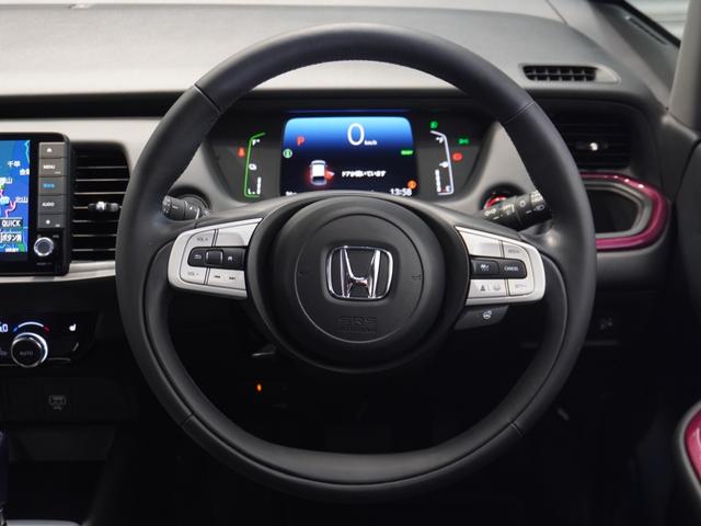 フィット ｅ：ＨＥＶリュクス　ワンオーナー　９型ナビ　衝突軽減ブレーキ　渋滞追従機能　リアカメラ　ＬＥＤオートライト　オートハイビーム　サイド＆カーテンＡＢ　Ｐセンサー　本革シート　ステアリングヒーター　ＥＴＣ２．０　ＵＳＢ（33枚目）
