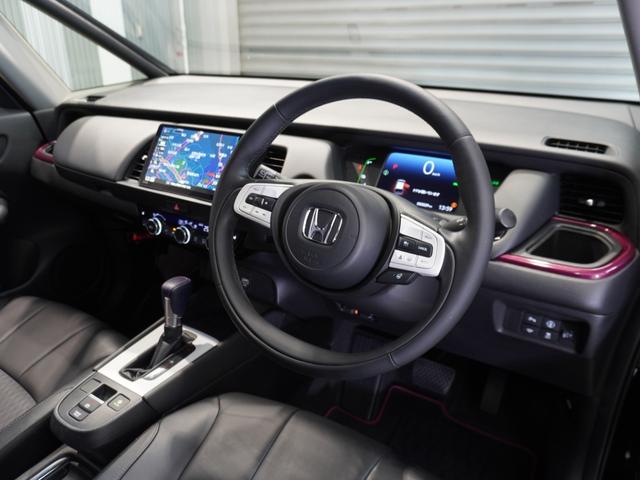 フィット ｅ：ＨＥＶリュクス　ワンオーナー　９型ナビ　衝突軽減ブレーキ　渋滞追従機能　リアカメラ　ＬＥＤオートライト　オートハイビーム　サイド＆カーテンＡＢ　Ｐセンサー　本革シート　ステアリングヒーター　ＥＴＣ２．０　ＵＳＢ（34枚目）