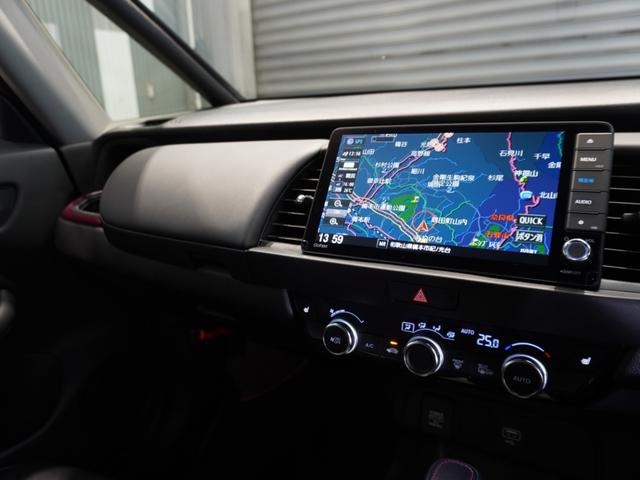 フィット ｅ：ＨＥＶリュクス　ワンオーナー　９型ナビ　衝突軽減ブレーキ　渋滞追従機能　リアカメラ　ＬＥＤオートライト　オートハイビーム　サイド＆カーテンＡＢ　Ｐセンサー　本革シート　ステアリングヒーター　ＥＴＣ２．０　ＵＳＢ（35枚目）