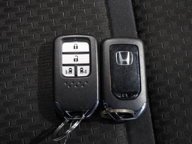 ステップワゴンスパーダ スパーダホンダセンシング　７人乗り　わくわくゲート　１０型ナビ　衝突軽減ブレーキ　ナビ連動ドラレコ　ＬＥＤオートライト　両側ＰＳＤ　革巻ステアリング　シートバックテーブル　ブルートゥース　音楽録音機能　ＵＳＢ　ＥＴＣ　Ｒカメラ（52枚目）