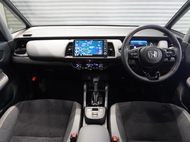 フィット e:HEVRS ワンオーナー 9型ナビ ナビ連動前後ドラレコ 衝突軽減ブレーキ 急アクセル抑制機能 サイド&カーテンAB LEDオートライト オートハイビーム パーキングセンサー ブレーキホールド Rカメラ ETC(13枚目)