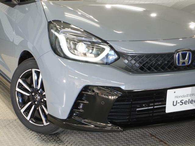 フィット e:HEVRS ワンオーナー 9型ナビ ナビ連動前後ドラレコ 衝突軽減ブレーキ 急アクセル抑制機能 サイド&カーテンAB LEDオートライト オートハイビーム パーキングセンサー ブレーキホールド Rカメラ ETC(28枚目)