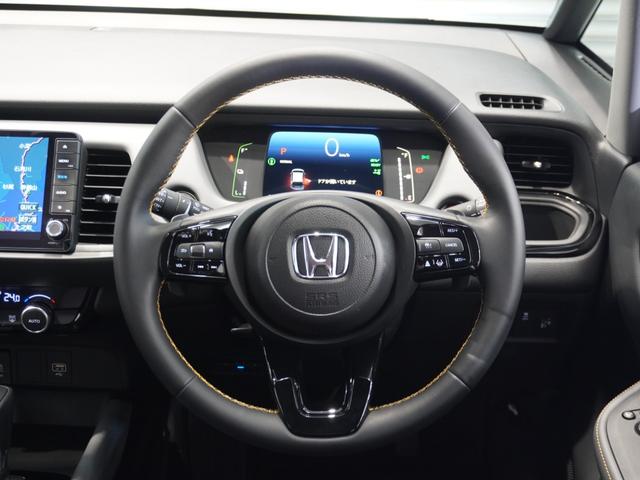 フィット e:HEVRS ワンオーナー 9型ナビ ナビ連動前後ドラレコ 衝突軽減ブレーキ 急アクセル抑制機能 サイド&カーテンAB LEDオートライト オートハイビーム パーキングセンサー ブレーキホールド Rカメラ ETC(32枚目)