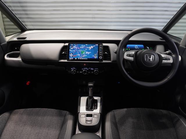 フィット ｅ：ＨＥＶホーム　当社デモカー　純正９型メモリーナビ　フルセグ　ミュージックラック　ＤＶＤｂｌｕｅｔｏｏｔｈホンダセンシング　渋滞追従　ＬＥＤヘッドライト　ＥＴＣ　純正ドライブレコーダー　リアカメラ（13枚目）