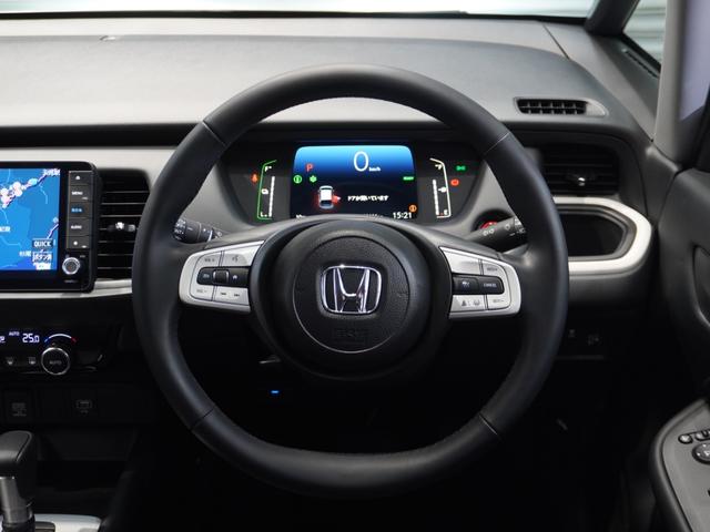 フィット ｅ：ＨＥＶホーム　当社デモカー　純正９型メモリーナビ　フルセグ　ミュージックラック　ＤＶＤｂｌｕｅｔｏｏｔｈホンダセンシング　渋滞追従　ＬＥＤヘッドライト　ＥＴＣ　純正ドライブレコーダー　リアカメラ（32枚目）