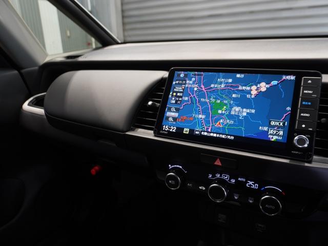 フィット ｅ：ＨＥＶホーム　当社デモカー　純正９型メモリーナビ　フルセグ　ミュージックラック　ＤＶＤｂｌｕｅｔｏｏｔｈホンダセンシング　渋滞追従　ＬＥＤヘッドライト　ＥＴＣ　純正ドライブレコーダー　リアカメラ（34枚目）