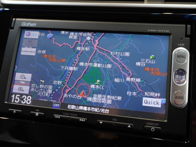 フィットハイブリッド Ｆパッケージ　純正ナビ　ＥＴＣ　リアカメラ　ブルートゥース　ワンセグＴＶ　電動格納ドアミラー　プライバシーガラス　アームレストコンソール　オートエアコン　スマートキー２個　ワンオーナー（2枚目）