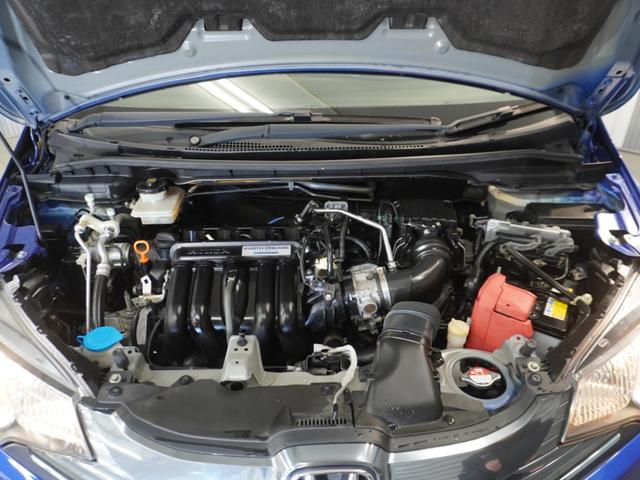 フィットハイブリッド Ｆパッケージ　純正ナビ　ＥＴＣ　リアカメラ　ブルートゥース　ワンセグＴＶ　電動格納ドアミラー　プライバシーガラス　アームレストコンソール　オートエアコン　スマートキー２個　ワンオーナー（21枚目）