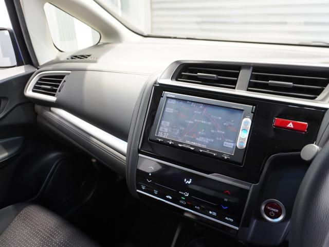 フィットハイブリッド Ｆパッケージ　純正ナビ　ＥＴＣ　リアカメラ　ブルートゥース　ワンセグＴＶ　電動格納ドアミラー　プライバシーガラス　アームレストコンソール　オートエアコン　スマートキー２個　ワンオーナー（34枚目）