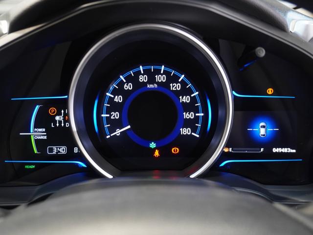 フィットハイブリッド Ｆパッケージ　純正ナビ　ＥＴＣ　リアカメラ　ブルートゥース　ワンセグＴＶ　電動格納ドアミラー　プライバシーガラス　アームレストコンソール　オートエアコン　スマートキー２個　ワンオーナー（44枚目）