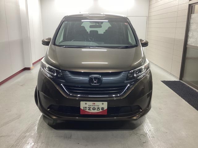 フリード Ｇ・ホンダセンシング　衝突被害軽減ブレーキ　横滑り防止装置　アイドリングストップ　ステアリングスイッチ　オートライト　キーフリーシステム　オートエアコン　ナビ　バックカメラ　ＥＴＣ　マット　バイザー（2枚目）