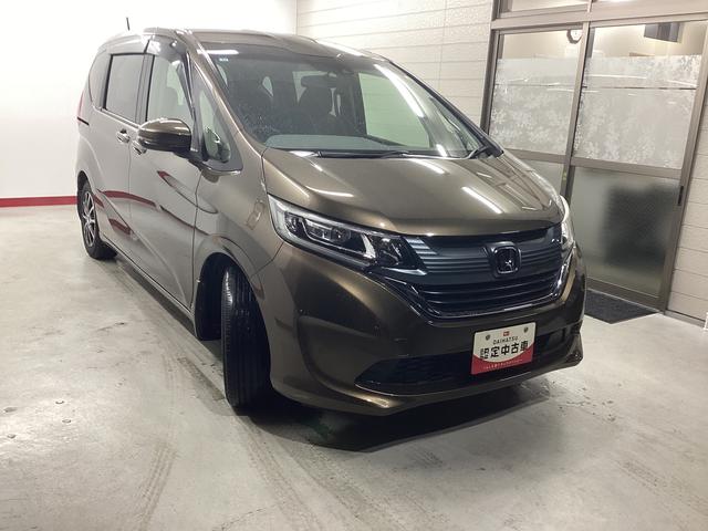 フリード Ｇ・ホンダセンシング　衝突被害軽減ブレーキ　横滑り防止装置　アイドリングストップ　ステアリングスイッチ　オートライト　キーフリーシステム　オートエアコン　ナビ　バックカメラ　ＥＴＣ　マット　バイザー（6枚目）