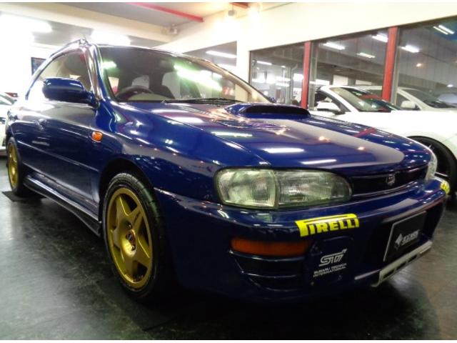 インプレッサスポーツワゴン ＷＲＸ　ＳＴｉバージョンＩＩ　５５５　１００台限定車ＥＪ２０ＢＯＸＥＲターボエンジン５ＭＴ４ＷＤ柿本マフラーＳＴＩタワーバー限定スポーツブルーカラーＳＴＩエアロスピードラインＡＷアンダーカバーＮＡＲＤＩステアナビＴＶ２オーナＴベルト交換済（2枚目）