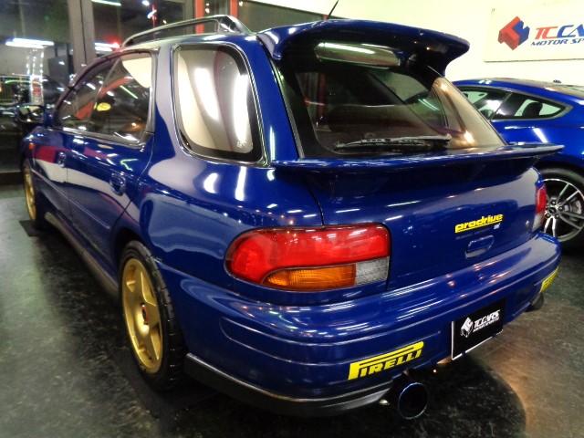 インプレッサスポーツワゴン ＷＲＸ　ＳＴｉバージョンＩＩ　５５５　１００台限定車ＥＪ２０ＢＯＸＥＲターボエンジン５ＭＴ４ＷＤ柿本マフラーＳＴＩタワーバー限定スポーツブルーカラーＳＴＩエアロスピードラインＡＷアンダーカバーＮＡＲＤＩステアナビＴＶ２オーナＴベルト交換済（4枚目）