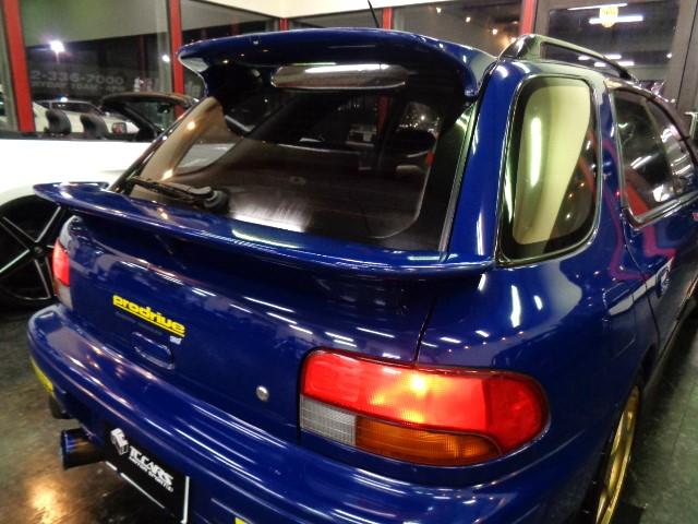 インプレッサスポーツワゴン ＷＲＸ　ＳＴｉバージョンＩＩ　５５５　１００台限定車ＥＪ２０ＢＯＸＥＲターボエンジン５ＭＴ４ＷＤ柿本マフラーＳＴＩタワーバー限定スポーツブルーカラーＳＴＩエアロスピードラインＡＷアンダーカバーＮＡＲＤＩステアナビＴＶ２オーナＴベルト交換済（21枚目）