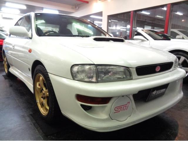 インプレッサ ＷＲＸ　ＳＴｉバージョンＩＶ　２２Ｂ仕様エアロＥＪ２０ＢＯＸＥＲターボエンジン５ＭＴミッション４ＷＤステンマフラーＳＴＩ足回りレッド対向キャリパーラムコ追加メーターＳＴＩカーボンタワーバーＳＴＩアルミＭＯＭＯステアＴベルト交換済（2枚目）
