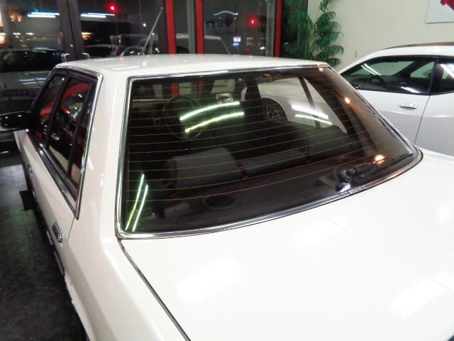 スカイライン 2000ターボRS-X DR30鉄仮面EJ20ETターボエンジン純正5MTミッション専用2本出しマフラーフェンダーフィントランクスポイラー純正アルミホブラックシートD席電動サポートフルノーマル1オーナー親族名変走行6万km(17枚目)