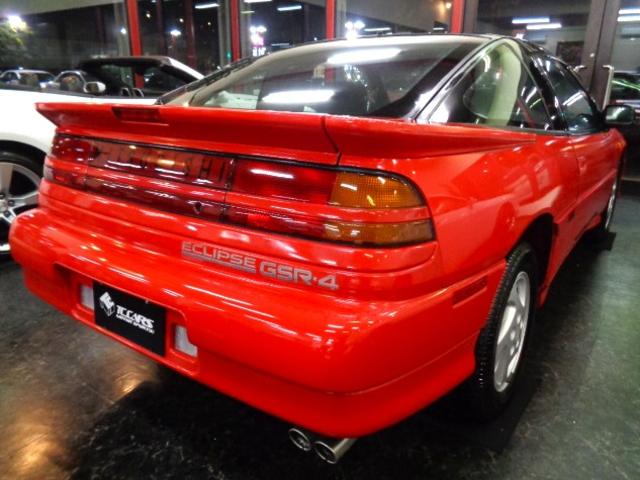エクリプス ＧＳＲ－４　４Ｇ６３ターボエンジン純正５ＭＴミッション４ＷＤ専用２本出しマフラーパッションレッドカラー専用フルエアロ純正アルミマイルコンビメーターリトラクタブルヘッドライト走行３万ｋｍ台フルノーマル車ジャッキーＣ（3枚目）