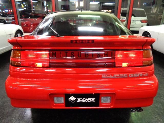 エクリプス ＧＳＲ－４　４Ｇ６３ターボエンジン純正５ＭＴミッション４ＷＤ専用２本出しマフラーパッションレッドカラー専用フルエアロ純正アルミマイルコンビメーターリトラクタブルヘッドライト走行３万ｋｍ台フルノーマル車ジャッキーＣ（9枚目）