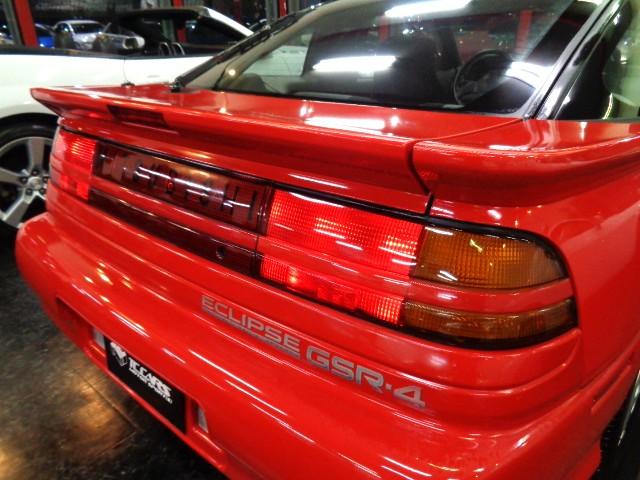 エクリプス ＧＳＲ－４　４Ｇ６３ターボエンジン純正５ＭＴミッション４ＷＤ専用２本出しマフラーパッションレッドカラー専用フルエアロ純正アルミマイルコンビメーターリトラクタブルヘッドライト走行３万ｋｍ台フルノーマル車ジャッキーＣ（11枚目）