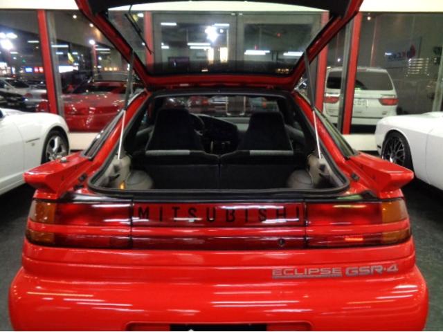 エクリプス ＧＳＲ－４　４Ｇ６３ターボエンジン純正５ＭＴミッション４ＷＤ専用２本出しマフラーパッションレッドカラー専用フルエアロ純正アルミマイルコンビメーターリトラクタブルヘッドライト走行３万ｋｍ台フルノーマル車ジャッキーＣ（37枚目）