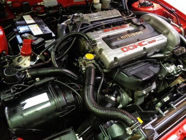 エクリプス ＧＳＲ－４　４Ｇ６３ターボエンジン純正５ＭＴミッション４ＷＤ専用２本出しマフラーパッションレッドカラー専用フルエアロ純正アルミマイルコンビメーターリトラクタブルヘッドライト走行３万ｋｍ台フルノーマル車ジャッキーＣ（39枚目）