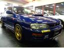 インプレッサスポーツワゴン ＷＲＸ　ＳＴｉバージョンＩＩ　５５５　１００台限定車ＥＪ２０ＢＯＸＥＲターボエンジン５ＭＴ４ＷＤ柿本マフラーＳＴＩタワーバー限定スポーツブルーカラーＳＴＩエアロスピードラインＡＷアンダーカバーＮＡＲＤＩステアナビＴＶ２オーナＴベルト交換済（2枚目）