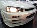 スカイライン GT R34GTRVスペックNISMO仕様フルエアロ4DセダンRB20DENEO6エンジン純正5MTミッション2本出しマフラー車高調追加メーターENKEI製RP03アルミクリアヘッドライトTベルト交換済(6枚目)