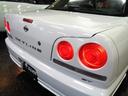 GT R34GTRVスペックNISMO仕様フルエアロ4DセダンRB20DENEO6エンジン純正5MTミッション2本出しマフラー車高調追加メーターENKEI製RP03アルミクリアヘッドライトTベルト交換済(12枚目)