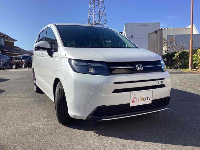 フリード ｅ：ＨＥＶエアー　ＥＸ　クリアランスソナー　オートクルーズコントロール　レーンアシスト　衝突被害軽減システム　両側電動スライドドア　オートライト　ＬＥＤヘッドランプ　スマートキー　アイドリングストップ　電動格納ミラー（15枚目）