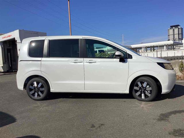 フリード ｅ：ＨＥＶエアー　ＥＸ　クリアランスソナー　オートクルーズコントロール　レーンアシスト　衝突被害軽減システム　両側電動スライドドア　オートライト　ＬＥＤヘッドランプ　スマートキー　アイドリングストップ　電動格納ミラー（16枚目）