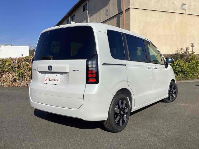 フリード ｅ：ＨＥＶエアー　ＥＸ　クリアランスソナー　オートクルーズコントロール　レーンアシスト　衝突被害軽減システム　両側電動スライドドア　オートライト　ＬＥＤヘッドランプ　スマートキー　アイドリングストップ　電動格納ミラー（18枚目）