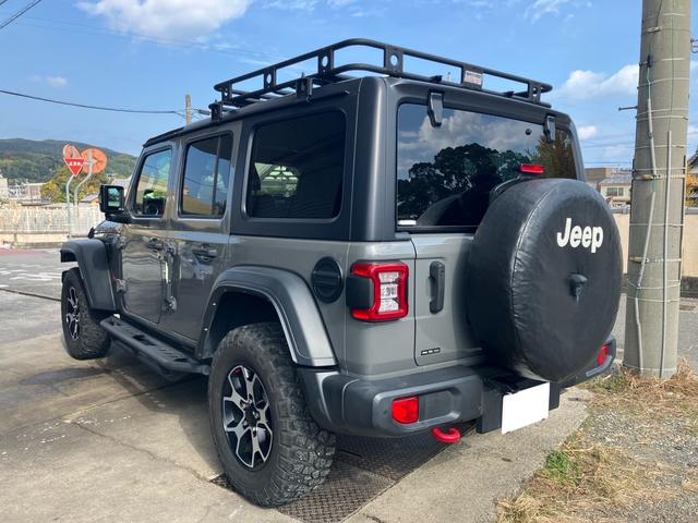 ジープ・ラングラーアンリミテッド ルビコン スミッティビルド ディフェンダーラック サイドステップ BESTOPサンライダー スタッドレスタイヤ付 純正ハードトップ積み込み ブラックレザーシート 純正ナビ バックカメラ サイドカメラ ドラレコ(13枚目)