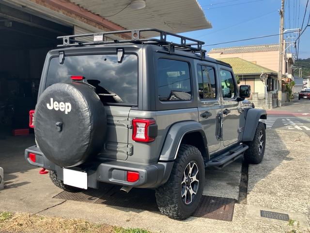 ジープ・ラングラーアンリミテッド ルビコン スミッティビルド ディフェンダーラック サイドステップ BESTOPサンライダー スタッドレスタイヤ付 純正ハードトップ積み込み ブラックレザーシート 純正ナビ バックカメラ サイドカメラ ドラレコ(15枚目)