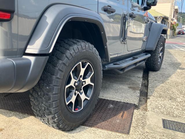 ジープ・ラングラーアンリミテッド ルビコン スミッティビルド ディフェンダーラック サイドステップ BESTOPサンライダー スタッドレスタイヤ付 純正ハードトップ積み込み ブラックレザーシート 純正ナビ バックカメラ サイドカメラ ドラレコ(16枚目)