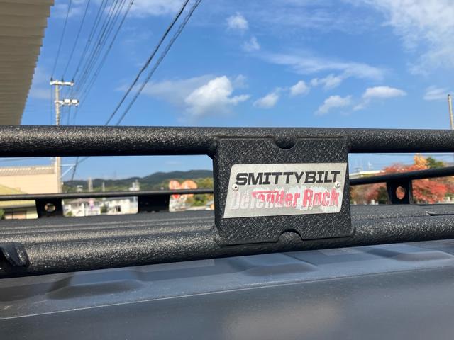 ジープ・ラングラーアンリミテッド ルビコン スミッティビルド ディフェンダーラック サイドステップ BESTOPサンライダー スタッドレスタイヤ付 純正ハードトップ積み込み ブラックレザーシート 純正ナビ バックカメラ サイドカメラ ドラレコ(65枚目)