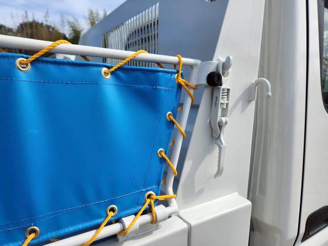 キャンター ２．９５ｔ　高床　強化ダンプ　最大積載量２９５０ｋｇ　５ＭＴ　１４０ＰＳ　ターボ車　左電格ミラー　ＥＴＣ　三方開　ピン差し　あゆみ掛け　新明和製　マフラー焼きなし　アドブルー不要　　左電格ミラー　　Ｎｏ．１０２５（12枚目）