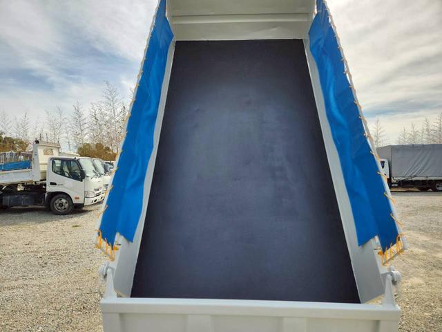 キャンター ２．９５ｔ　高床　強化ダンプ　最大積載量２９５０ｋｇ　５ＭＴ　１４０ＰＳ　ターボ車　左電格ミラー　ＥＴＣ　三方開　ピン差し　あゆみ掛け　新明和製　マフラー焼きなし　アドブルー不要　　左電格ミラー　　Ｎｏ．１０２５（15枚目）