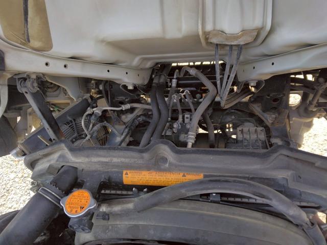 エルフトラック 　３ｔ　低床　強化ダンプ　最大積載量３，０００ｋｇ　６ＭＴ　左電格ミラー　坂道発進補助装置　三方開　ＥＴＣ　ピン差し　新明和　荷台内寸（Ｌ３０５／Ｗ１５９／Ｈ３７）　アドブルー不要　Ｎｏ．１０２９（38枚目）