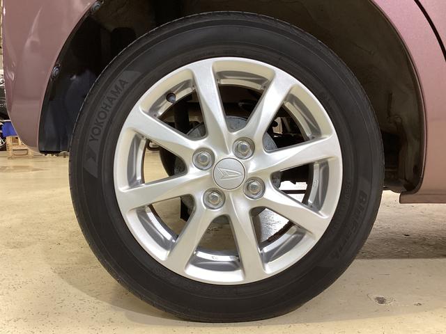 ムーヴ Ｘリミテッド　ワンオーナー　バックカメラ　ナビ　ワンセグ　ワンオーナー　バックカメラ　ナビ　ワンセグＴＶ　アクセサリーソケット　電動格納ミラー　スマートキー　オートエアコン　ＡＢＳ　アイドリングストップ　ヘッドライトレべライザー　１４インチ純正アルミホイール（60枚目）