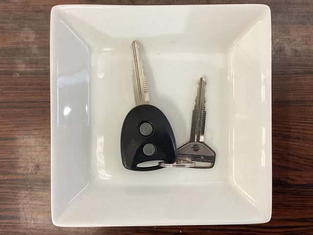 ミライース Ｘｆ　スマートセレクションＳＡ　４ＷＤ　ＣＤオーディオ　４ＷＤ　ＣＤオーディオ　ドアバイザー　横滑り防止装置　盗難防止装置　アイドリングストップ　　キーレスエントリー　ヘッドライトレべライザー　マニュアルエアコン　電動格納ミラー　アクセサリーソケット（13枚目）