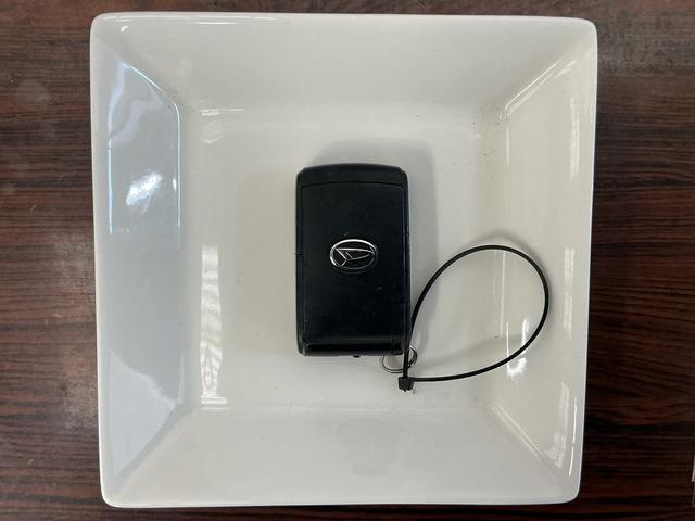 ムーヴ Ｘリミテッド　ワンオーナー　ナビ　バックカメラ　ワンセグＴＶ　ワンオーナー　ナビ　バックカメラ　１４インチ純正アルミホイール　ワンセグＴＶ　スマートキー　アイドリングストップ　盗難防止装置　１２Ｖ電源ソケット　ヘッドライトレべライザー　オートエアコン　ＡＢＳ（16枚目）