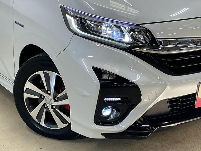 フリード+ハイブリッド ハイブリッドG・ホンダセンシング ナビ バックカメラ ETC カーナビゲーション バックカメラ ETC 無限エアロ 後席両側電動スライドドア コーナーセンサー クルーズコントロール 前席シートヒーター ホンダセンシング オートエアコン キーフリー(11枚目)