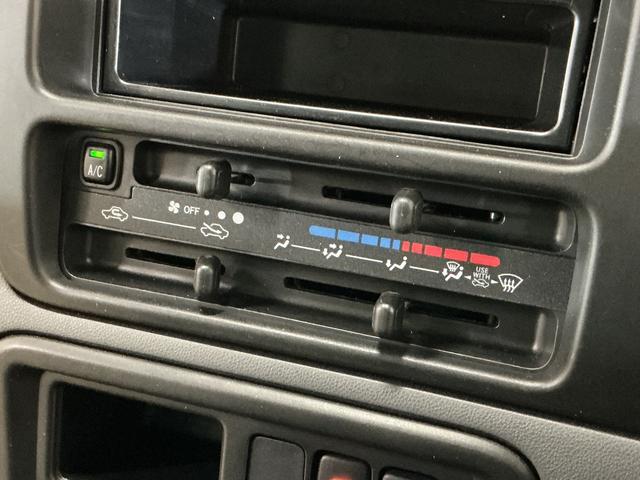 ハイゼットカーゴ ＤＸ　ワンオーナー　５速ＭＴ車　４ＷＤ　ＣＤオーディオ　ワンオーナー　５速ＭＴ車　４ＷＤ　ＣＤオーディオ　ラバーマット　キーレスエントリー　ドアバイザー　マニュアルエアコン　ヘッドライトレべライザー　シガーソケット　スペアタイヤ（51枚目）