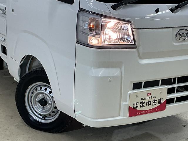 ハイゼットトラック スタンダード　ワンオーナー　４ＷＤ　ＣＶＴ車　ラジオデッキ　ワンオーナー　４ＷＤ　ＣＶＴ車　ラジオデッキ　リアコーナーセンサー　３方開　オートライト　横滑り防止装置　アイドリングストップ　スペアキー有り　マニュアルエアコン　１２Ｖ電源ソケット　バッテリーカバー（7枚目）