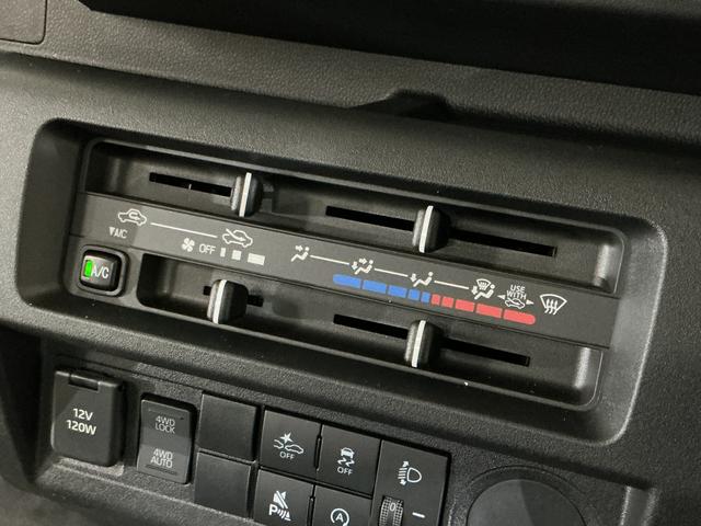 ハイゼットトラック スタンダード　ワンオーナー　４ＷＤ　ＣＶＴ車　ラジオデッキ　ワンオーナー　４ＷＤ　ＣＶＴ車　ラジオデッキ　リアコーナーセンサー　３方開　オートライト　横滑り防止装置　アイドリングストップ　スペアキー有り　マニュアルエアコン　１２Ｖ電源ソケット　バッテリーカバー（46枚目）