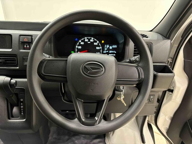 ハイゼットカーゴ ＤＸ　４ＷＤ　ＡＴ　ＡＭ／ＦＭラジオチューナー　ハロゲンヘッドランプ　トップシェイドガラス　コーナーセンサー　オーバーヘッドシェルフ　フロントドアパワーウインドウ　キーレスエントリー　ＡＭ／ＦＭラジオ　テンパータイヤ　スチールホイール（11枚目）