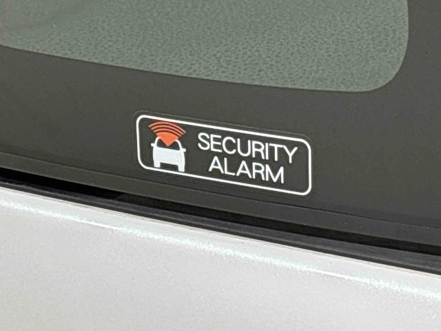 タント カスタムＲＳ　ターボ　運転席・助手席シートヒーター　純正ナビ装着用アップグレードパック　両側電動スライドドア　格納式リヤドアサンシェード　本革巻ステアリングホイール　運転席シートリフター　チルトステアリング　オートライト　キーフリーシステム（42枚目）