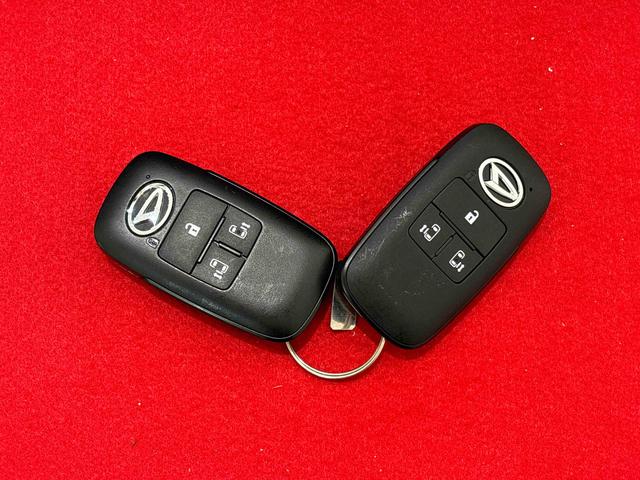 タント カスタムＲＳ　ターボ　運転席・助手席シートヒーター　純正ナビ装着用アップグレードパック　両側電動スライドドア　格納式リヤドアサンシェード　本革巻ステアリングホイール　運転席シートリフター　チルトステアリング　オートライト　キーフリーシステム（51枚目）