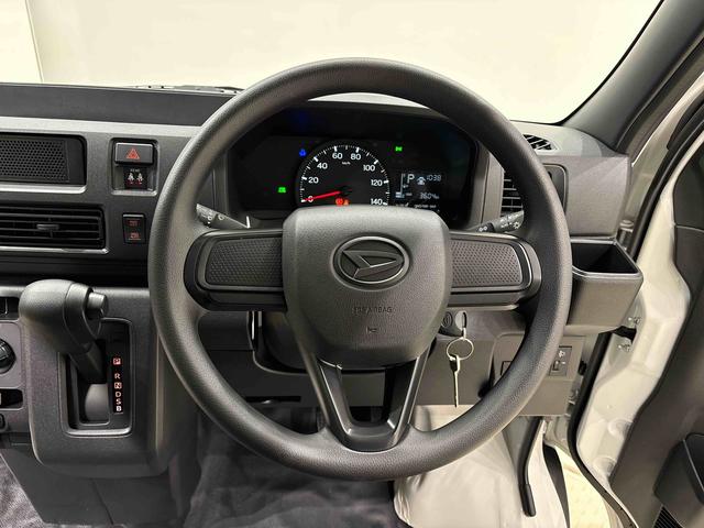 ハイゼットカーゴ DX キーレスエントリー オーバーヘッドシェルフ AMFMラジオ リヤヒーター オーバーヘッドシェルフ ヒルホールドシステム VSC&TRC リバース連動リヤワイパー 手引き式サイドブレーキ フロントドアパワーウインドウ(運転席挟み込み防止機構付き)(11枚目)